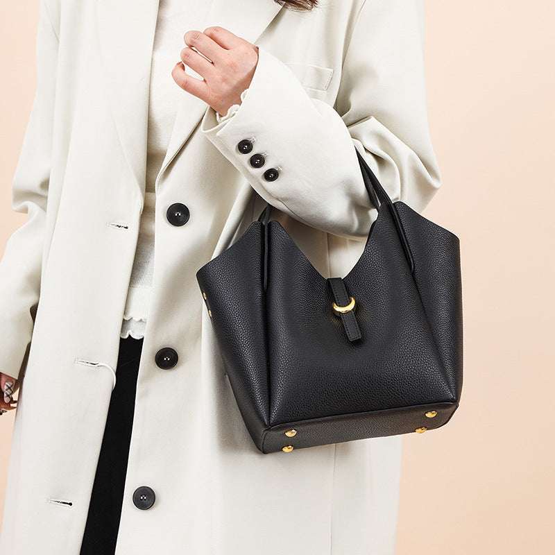 Hand Holding Bucket Bag