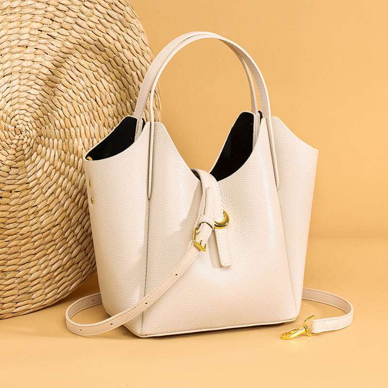 Hand Holding Bucket Bag